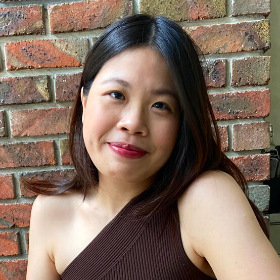 Photo of me smiling and looking at the camera.